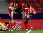 Llorente y Lemar celebran un gol del Atl&eacute;tico