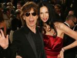 El cantante Mick Jagger y la modelo L'Wren Scott.