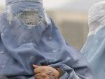 Unas mujeres portando el burka. (EFE/Syed Jan Sabawoon)