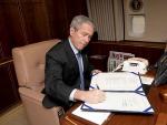 El presidente de Estados Unidos, George W. Bush, en su avi&oacute;n Air Force One. (Chris Greenberg / EFE).