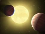 Representaci&oacute;n art&iacute;sticas de los dos nuevos planetas descubiertos por el Observatorio Kepler.