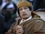 Imagen del presidente libio, Muamar Gadafi, en una ceremonia religiosa en Tr&iacute;poli en 13 de febrero.