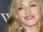 Madonna posa para los medios durante la presentaci&oacute;n de su pel&iacute;cula 'W.E' en Nueva York.