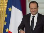El presidente franc&eacute;s, Fran&ccedil;ois Hollande, sonr&iacute;e durante una rueda de prensa.