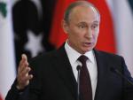 El presidente Rusia, Vlad&iacute;mir Putin, comparece durante una rueda de prensa ofrecida en el marco de la cumbre del Foro de los Pa&iacute;ses Exportadores de Gas (FPEG).