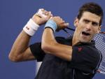 El tenista serbio Novak Djokovic, durante su partido frente a Mikhail Youzhny en cuartos de final del Abierto de Estados Unidos.