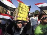 Partidarios del presidente sirio Bashar al-Assad protestan por las amenazas militares contra Siria.