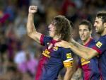Carles Puyol celebra un gol con el Bar&ccedil;a.