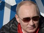 El presidente de Rusia, Vladimir Putin, toma un refresco en una estaci&oacute;n de invierno rusa.