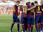 Los jugadores del FC Barcelona celebran uno de sus goles en Vallecas.