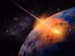 Representaci&oacute;n de un meteorito impactando contra la Tierra.