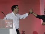 Pablo Iglesias junto a Alexis Tsipras en el cierre de campa&ntilde;a de Syriza ante las elecciones griegas.