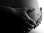 Imagen de una embarazada sosteniendo su vientre.