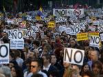 Miles de personas en las inmediaciones de la plaza de Neptuno de Madrid, para participar la marcha 'Rodea el Congreso'.