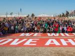 Foto colectiva reclamando acci&oacute;n contra el cambio clim&aacute;tico en Marrakech.