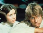 Fisher y Hamill en una escena de Star Wars: Una nueva esperanza, el filme que los catapult&oacute; a la fama.