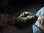 Recreaci&oacute;n art&iacute;stica de la NASA que muestra como un asteroide se acerca peligrosamente a la Tierra.