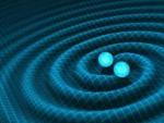 Gr&aacute;fico que representa las ondas gravitacionales producidas por la fusi&oacute;n de dos agujeros negros.