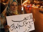Imagen de archivo de una mujer en las protestas en Egipto.