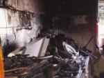 Valladolid.- Cocina afectada por las llamas en la Avenida Segovia