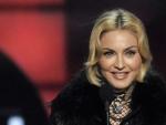 Madonna recogiendo un galard&oacute;n por su gira 'MDNA Tour' en los Premios Billboard.
