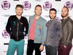 <p>Jonny Buckland, Chris Martin, Guy Berryman y Will Champion de la banda británica Coldplay llegan a los Premios MTV Europa 2011</p>