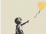 El grabado 'Ni&ntilde;a con globo' de Banksy.