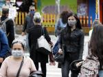 Ciudadanos con mascarillas por el coronavirus, en Bogot&aacute;, Colombia.