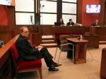 El presidente de la Generalitat, Quim Torra, durante su primer juicio en el TSJC por presunta desobediencia, el 18 de noviembre de 2019.