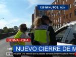 La Polic&iacute;a realiza un control a un conductor en Madrid minutos antes de la entrada en vigor del estado de alarma.