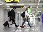 Viajeros internacionales a su llegada al aeropuerto de Palma.