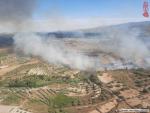 Sucesos.- Un incendio en Losa del Obispo obliga a desalojar un campamento de verano con 20 menores
