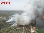 Desalojan un camping por un incendio en la Pobla de Massaluca (Tarragona)