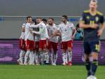 Los jugadores de Georgia celebran un gol ante Suecia