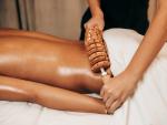 Woman on anti cellulite massage treatment. Madero therapy.