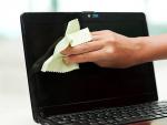Cleaning a netbook screen with an antistatic cloth