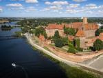 Malbork, Poland - August 14, 2021:Medieval Malbork Castle on the Nogat River, Poland. Historical capital of the Teutonic Order - Crusaders