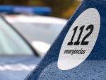 Detalle de un lateral de uno de los nuevos veh&iacute;culos de los Mossos con la imagen de tel&eacute;fono de emergencias 112.