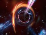 Un agujero negro supermasivo lanzando chorros mientras consume una estrella cercana.