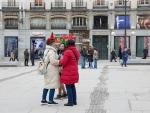 Varias personas por la calle en Madrid este mes de diciembre.