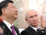 Xi Jinping, junto a Vladimir Putin.