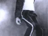 Michael Jackson hace uno de sus habituales movimientos.