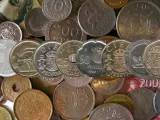 Algunas monedas de pesetas, retiradas en 2002 (AGENCIAS).