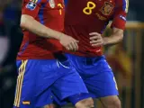 Villa y Xavi celebran el gol del asturiano.