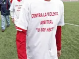 Los jugadores del equipo cadete de Los Silos de Burjassot con el lema 'Contra la violencia arbitral. Yo soy Héctor'.