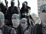 Las brigadas de Izz ad-Din al-Qassam, facción de la milicia de Hamás, durante un desfile en la plaza de al-Mena, en la franja de Gaza.