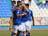 Los jugadores de la UD Melilla celebran un gol contra el UCAM Murcia.