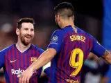 Luis Su&aacute;rez y Leo Messi.