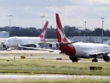 Aviones de la aerolínea australiana Qantas, en el aeropuerto de Sídney.