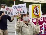 Manifestantes contra la celebraci&oacute;n de los Juegos ol&iacute;mpicos en Tokio